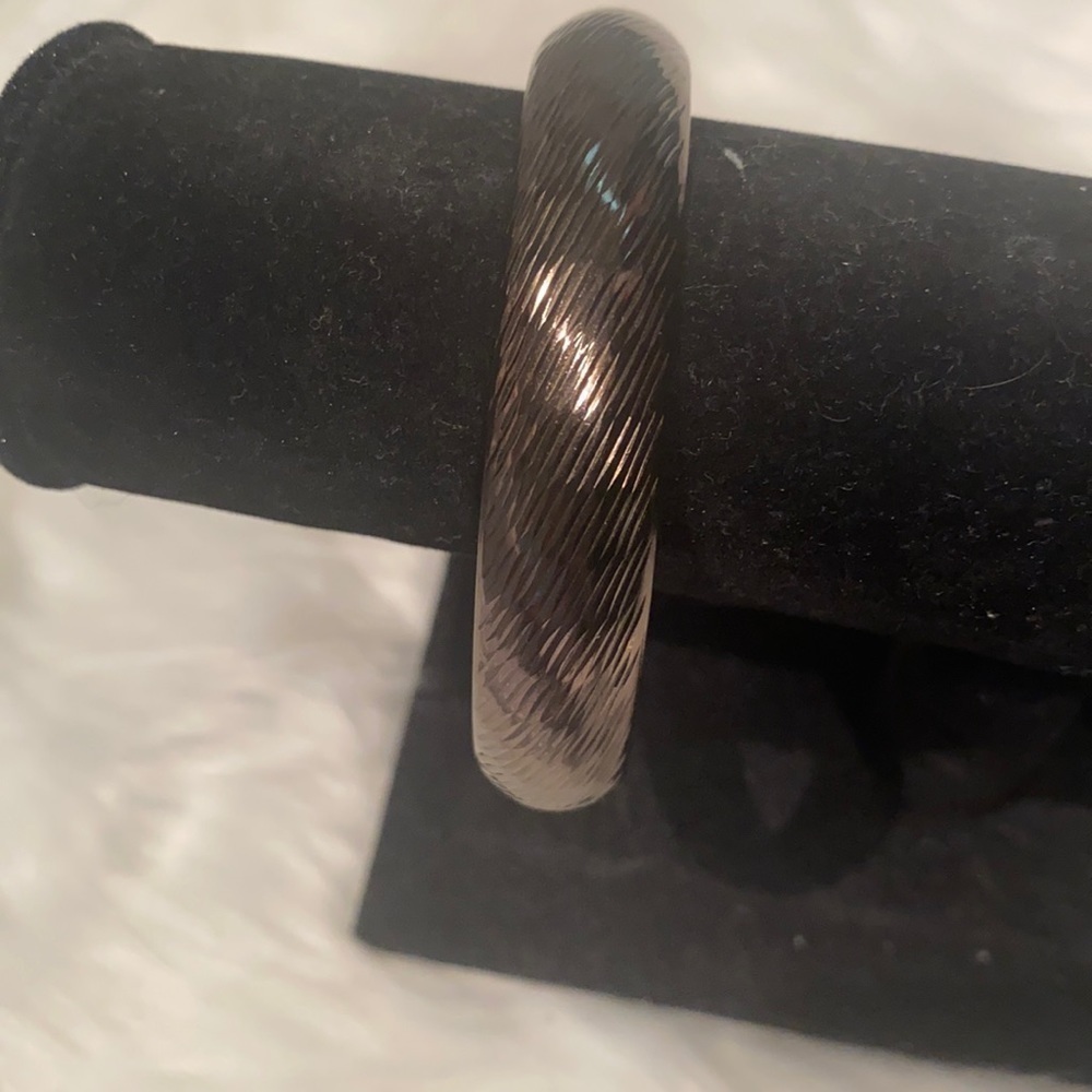 Women’s like new bronze bangle with security latch